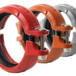 Three types of Shurjoint groove couplings in red, oriange and galvanised